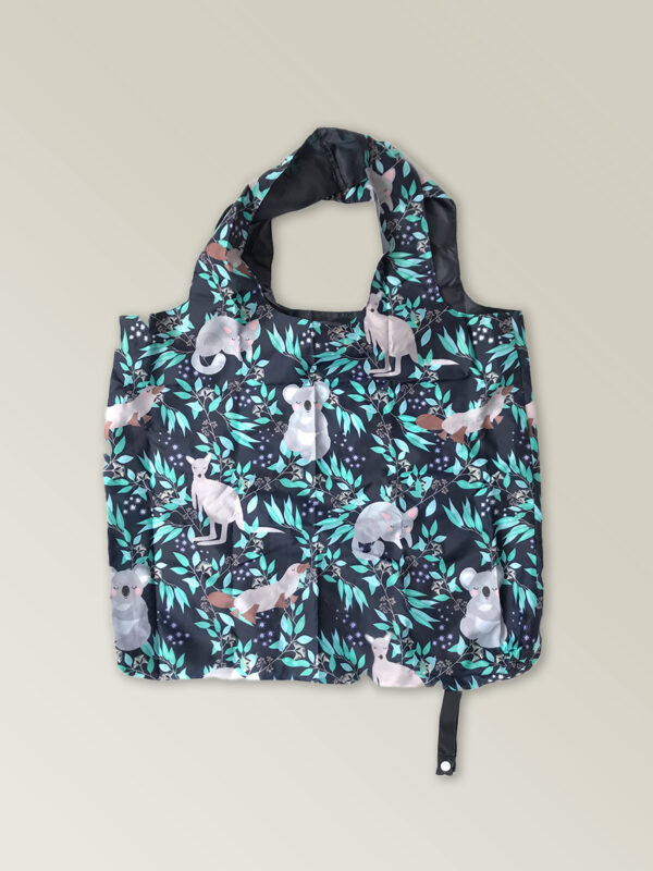 Foldable strong shopping bag printed with illustrations of Australian animals. It has a navy background. Made with polyester.