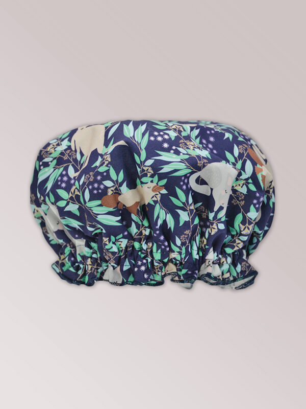 A waterproof shower cap with Aussie Flora fabric on the outside