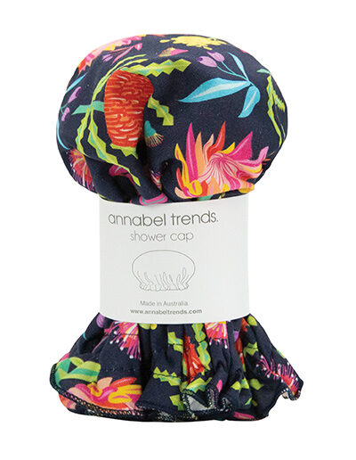 A waterproof shower cap with Aussie flora fabric on the outside. The shower cap comes wrapped in the middle with a heavy paper label.