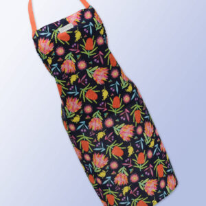 Fabric kitchen apron, dark navy with Aussie Flora print on it