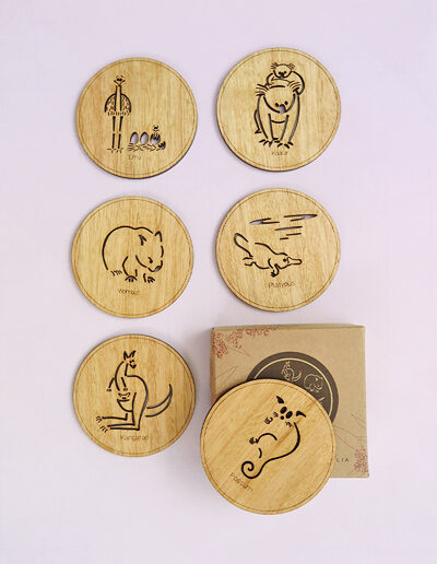 Set of six wooden coasters and their recycled cardboard presentation box. Each coaster is a different animal. They are Emu, Koala, Wombat, Platypus, Kangaroo and Possum
