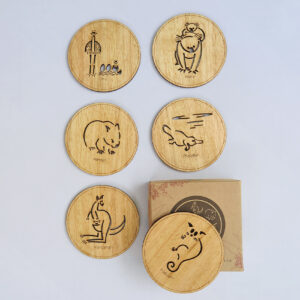 Set of six wooden coasters and their recycled cardboard presentation box. Each coaster is a different animal. They are Emu, Koala, Wombat, Platypus, Kangaroo and Possum