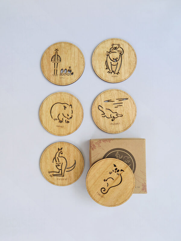 Set of six wooden coasters and their recycled cardboard presentation box. Each coaster is a different animal. They are Emu, Koala, Wombat, Platypus, Kangaroo and Possum