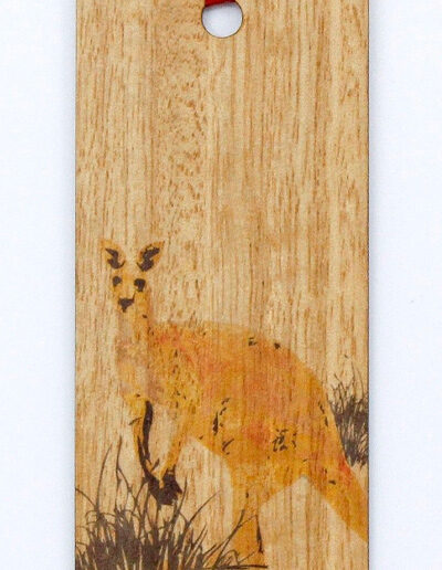 A close up of a coloured Kangaroo bookmark presented on recycled card