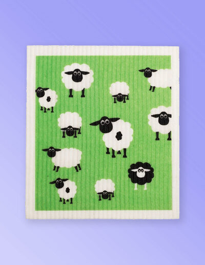 White dishcloth with a fun sheep design on it