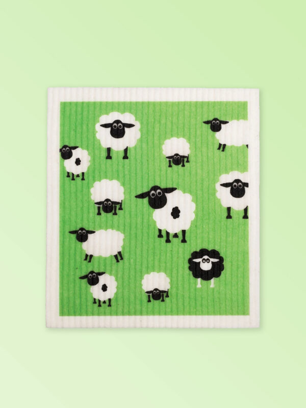 White dishcloth with a fun sheep design on it