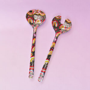 Melamine salad server set with artwork by Maggie Long printed on them.