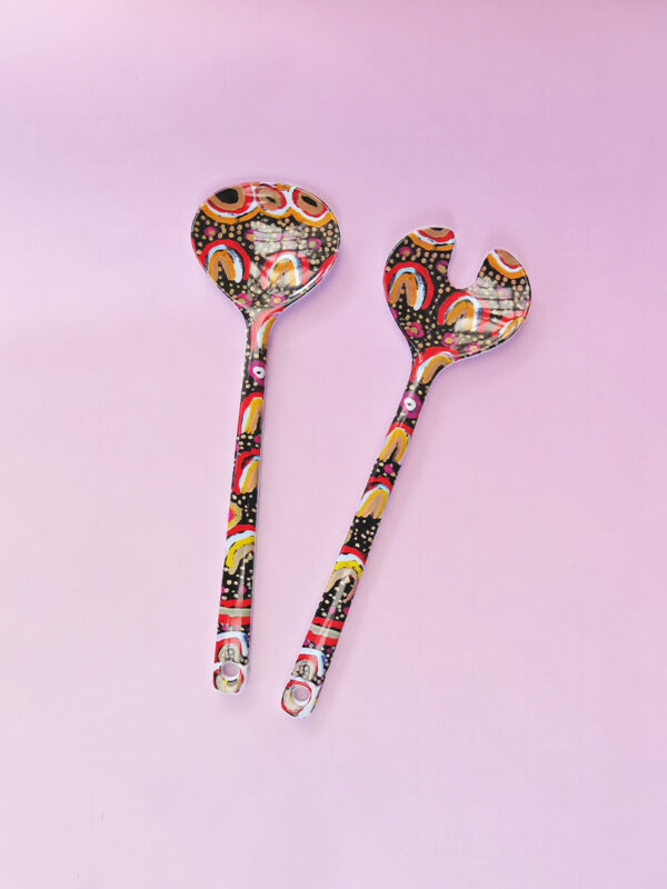 Melamine salad server set with artwork by Maggie Long printed on them.
