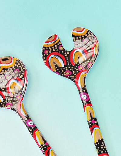 Melamine salad server set with artwork by Maggie Long printed on them.