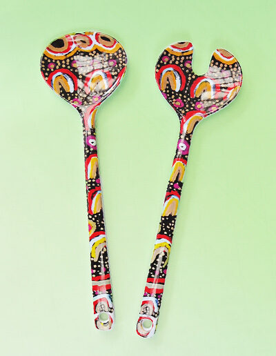 Melamine salad server set with artwork by Maggie Long printed on them.