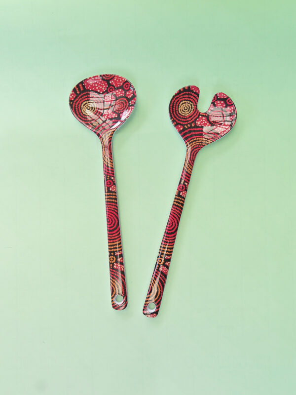 Melamine salad server set with artwork by Teddy Gibson printed on them.