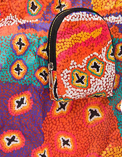 Foldable shopping tote featuring Ruth Stewarts artwork. Showing the pouch that is attached to the bag that the bag folds into