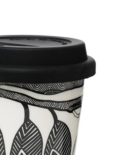 Close up of Dancing Wombat porcelain travel mug