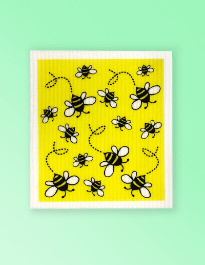 White dishcloth with a cute bee design on it