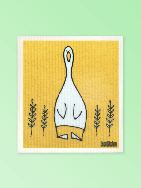 White dishcloth with a cute duck design on it