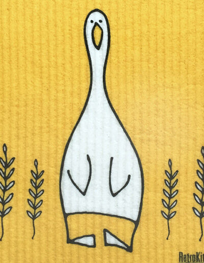A close up of a dishcloth with a cute duck design on it