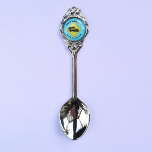 Souvenir spoon with Grey Nomads crest