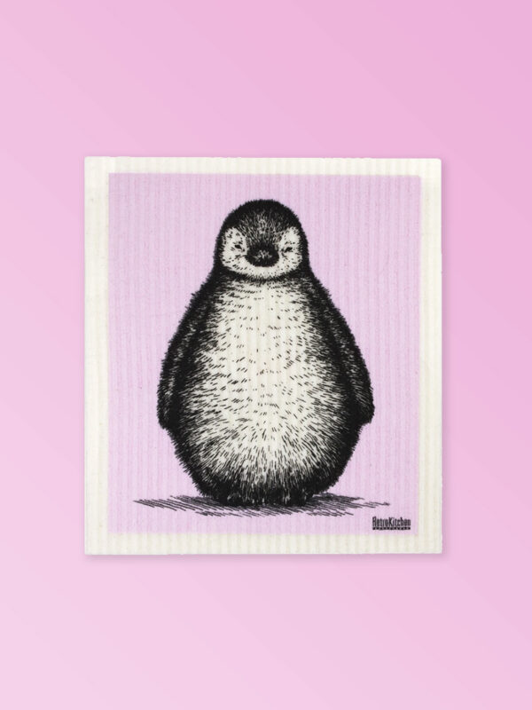 White dishcloth with a cute penguin design on it