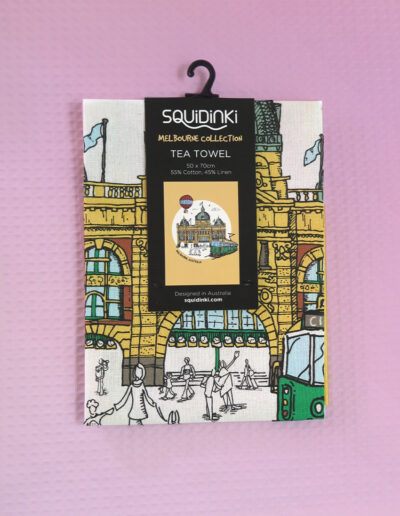 Printed cotton tea towel with the image of Melbournes Flinders Street Station and City Circle Tram