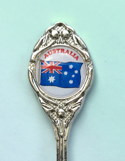 The crest of a souvenir spoon with the Australian Flag on it.