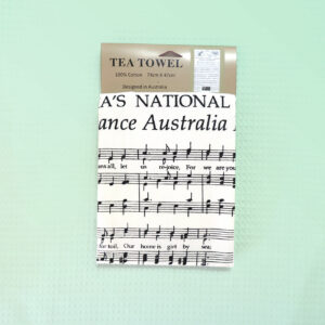 A white cotton tea towel with Australia's National Anthem in words and music on it.