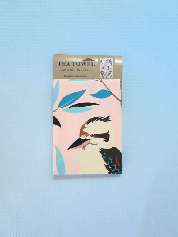 A light pink cotton tea towel with Kookaburra images printed on it.