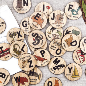 Wooden Australian Alphabet discs. 26 round wooden discs every letter of the alphabet and an image to go with that letter. e.g N is Ned Kelly.