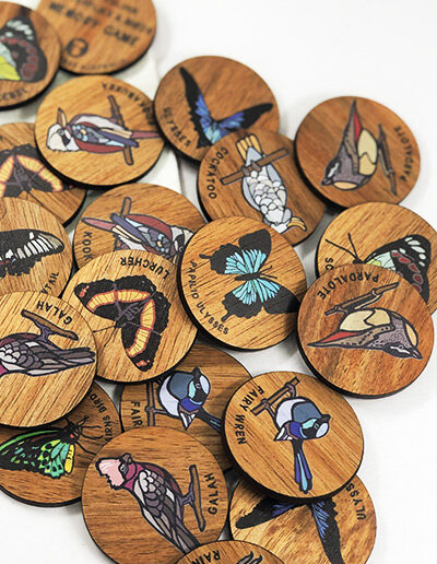 Wooden Australian Butterflies and Birds memory game. 24 round wooden discs with pairs of 12 different Australian butterflies and birds.