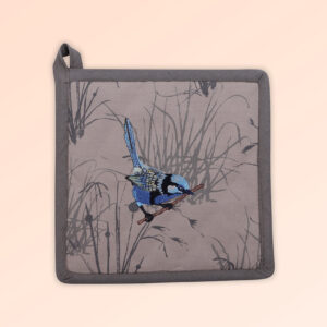 A square insulated pot holder with an embroidered blue wren perched in grasses as the fabric design. The fabric is a natural Australian organic cotton with brown/grey trim around it and a tab to hang it.