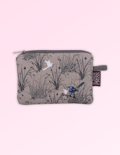 Fabric large purse with zip closure with an embroidered pair of blue wrens perched in grasses. The fabric is a natural Australian organic cotton.