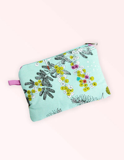 Fabric purse with zip closure. The fabric is Australian organic cotton with an aqua background and budgerigars and small native flowers in pastel colours