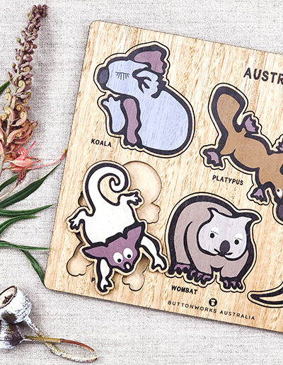 A wooden Australian animal puzzle. Rectangular in shape with 6 different colourful animal shapes to place back in the correct cut out shape.