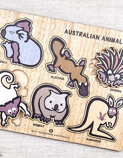 A wooden Australian animal puzzle. Rectangular in shape with 6 different colourful animal shapes to place back in the correct cut out shape.