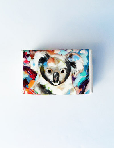 Bar of soap wrapped in paper with a Koala design.