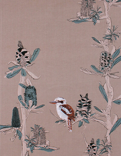 Tea towel with embroidered kookaburra sitting in screen printed banksia trees. The fabric is a natural Australian organic cotton.