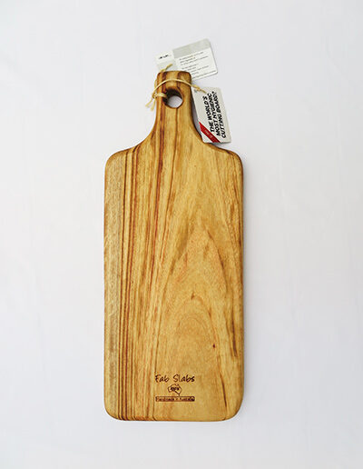 A large wooden paddle chopping board