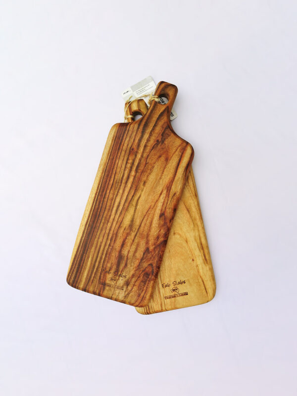 Two large wooden paddle chopping boards