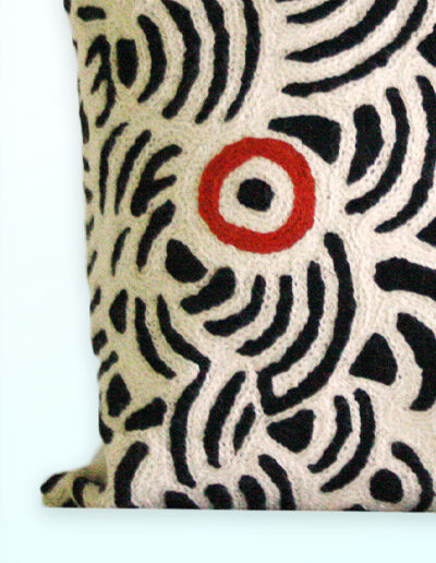 Detail of Better World Arts Wool cushion 30cm. Design by Nelly Patterson