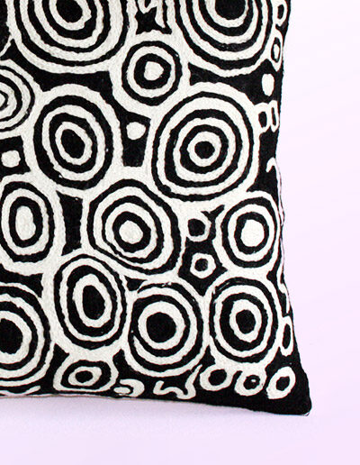 Detail of Better World Arts Wool cushion 40cm. Design by Nelly Patterson