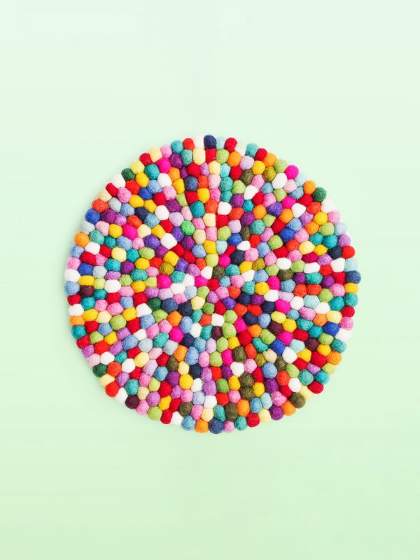 Large colourful felt ball trivet