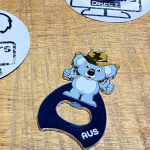 Koala metal magnet opener on a bar