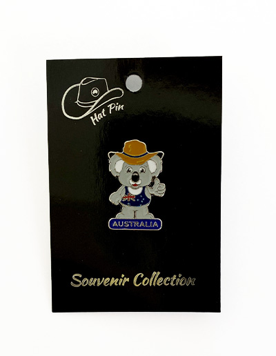 Koala with a hat and his thumb up with the word Australia pin on a card