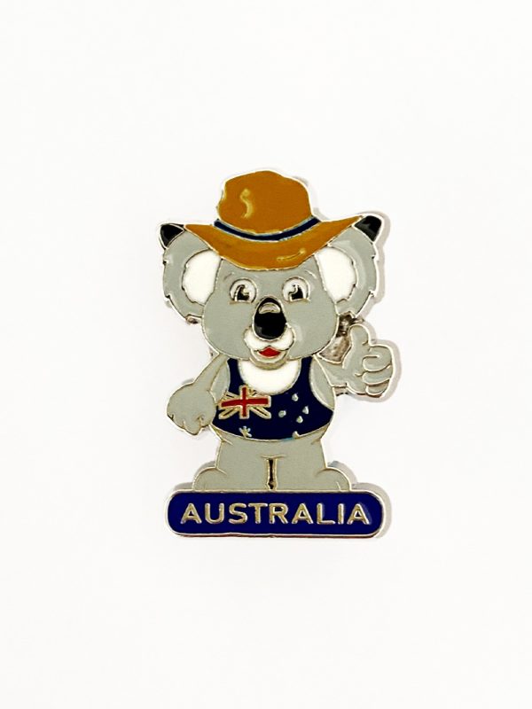 Koala with a hat and his thumb up with the word Australia pin