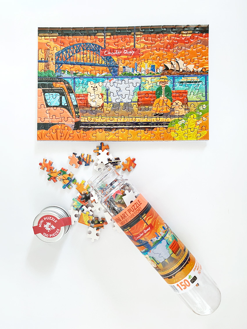 Mini art puzzle 150 piece - Circular Quay. Showing tube packaging and completed puzzle.